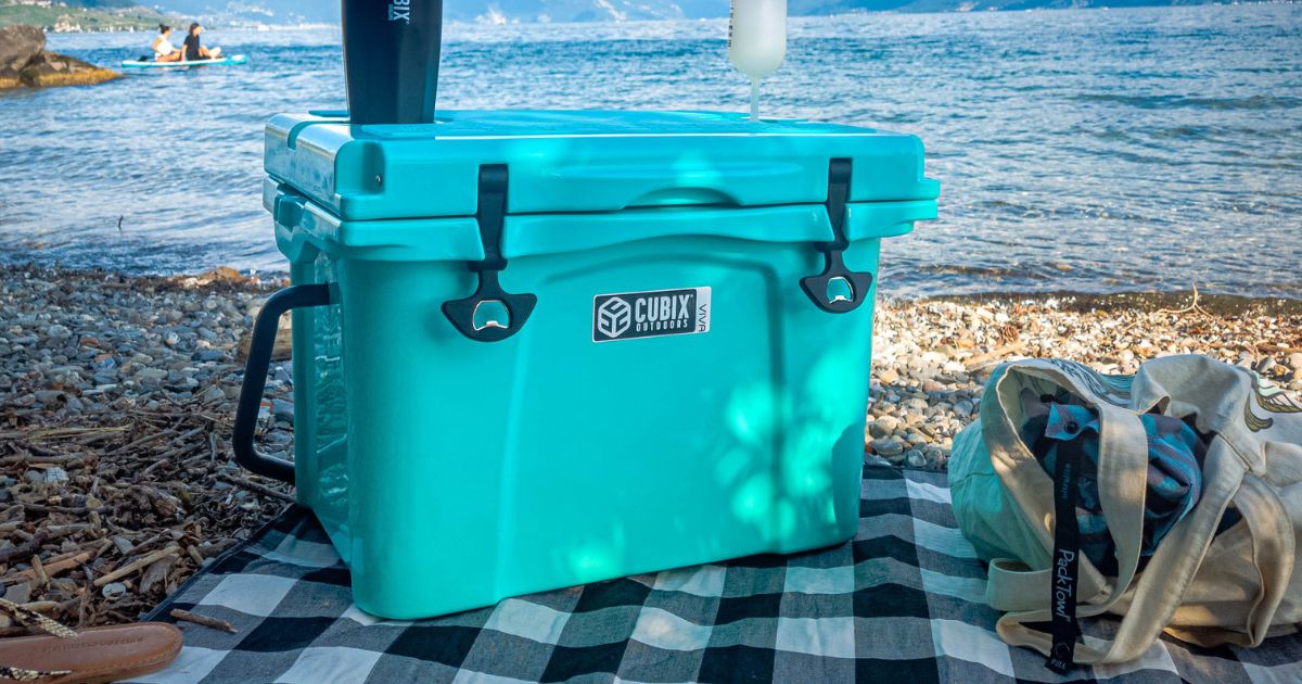 25 Quart Viva Cubix cooler and tumbler on a picnic blanket by the sea