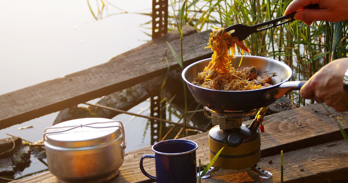 Cooking food on a camp stove