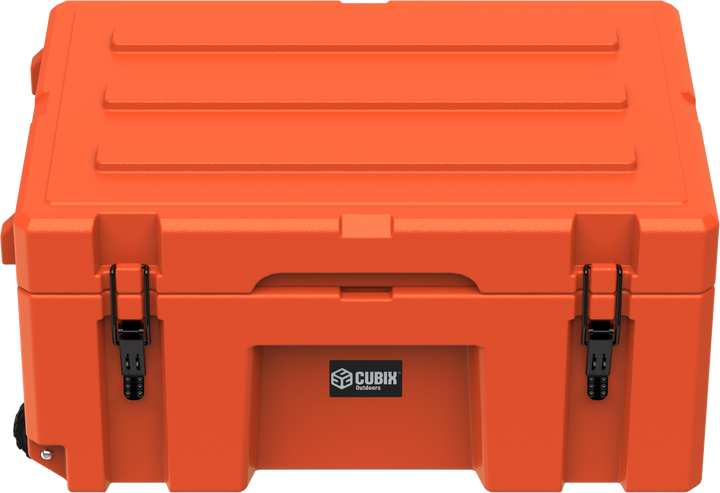 Cubix 76L rolling cargo case in Ember Orange with telescoping handle extended and wheels